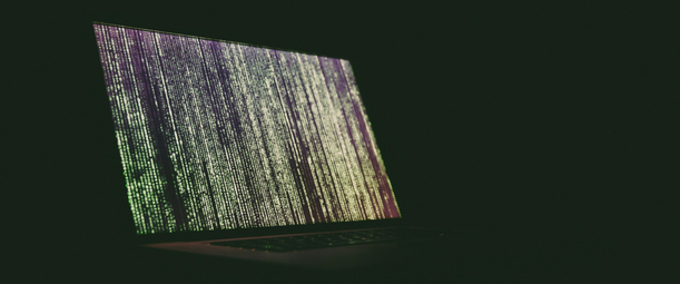 Изображение. Клавиатура ноутбука с замком и ключом в неоновой подсветке